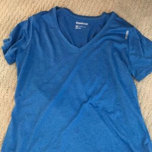 Blue Reebok v neck t shirt